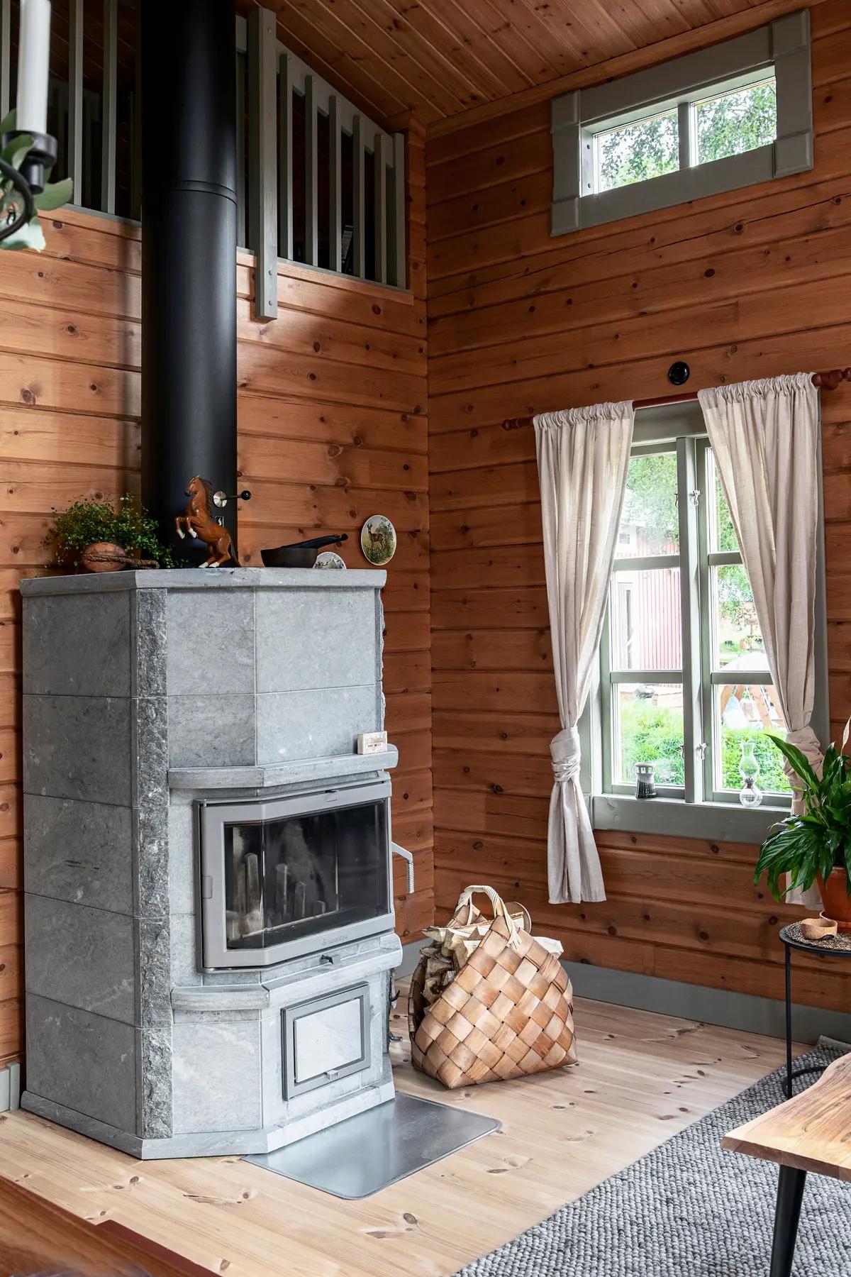 Печь из талькомагнезита в интерьере финского дома 50 кв. м.